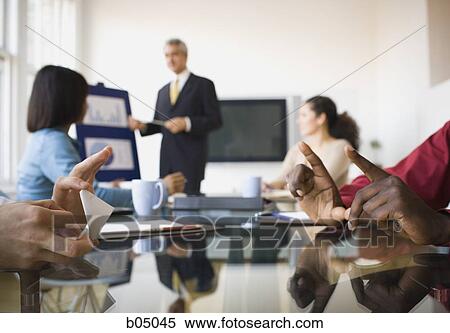 Two businessmen playing at meeting View Large Photo Image Stock Photography - Two businessmen playing at meeting. Fotosearch