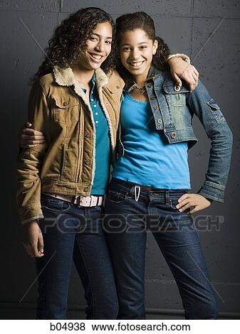 Stock Photo - Two girls smiling. Fotosearch