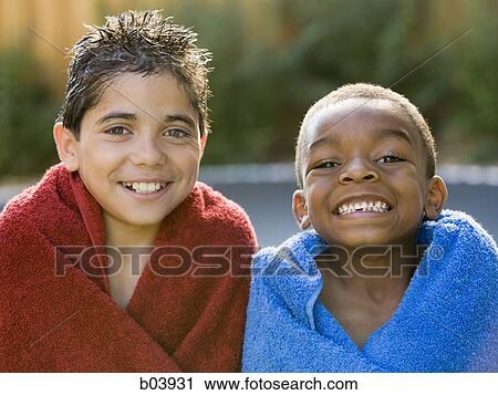 Two male children wrapped in towels View Large Photo Image Stock Image - Two male children wrapped in towels. Fotosearch