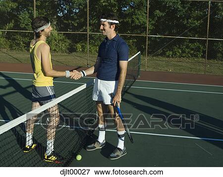 Two men shaking hands View Large Photo Image Stock Photo - Two men shaking hands. Fotosearch