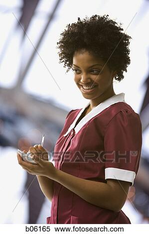 Waitress taking an order View Large Photo Image Stock Photography - Waitress taking an order. Fotosearch