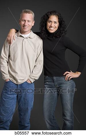 Woman and man embracing View Large Photo Image Stock Photo - Woman and man embracing. Fotosearch