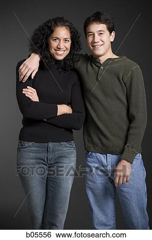 Stock Photograph - Woman and man embracing. Fotosearch