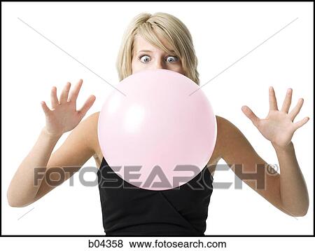 Woman blowing bubble View Large Photo Image Stock Photo - Woman blowing bubble. Fotosearch