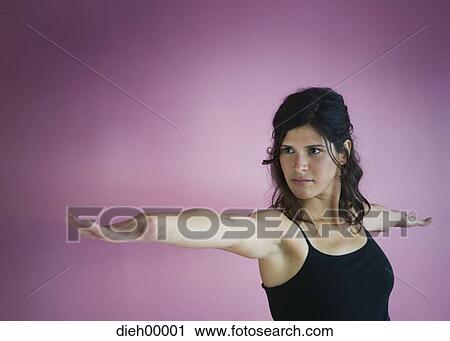 Woman doing yoga View Large Photo Image Stock Image - Woman doing yoga. Fotosearch