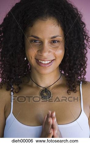 Stock Photograph - Woman doing yoga. Fotosearch