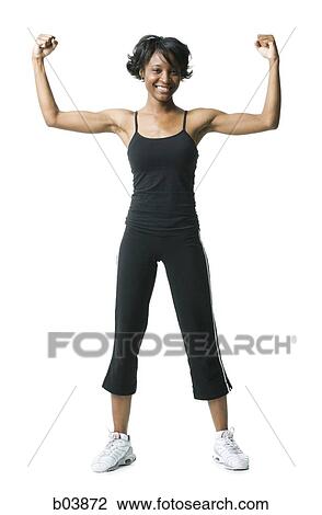 Woman flexing arm muscles View Large Photo Image Stock Image - Woman flexing arm muscles. Fotosearch