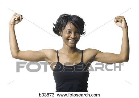 Woman flexing arms View Large Photo Image Stock Image - Woman flexing arms. Fotosearch