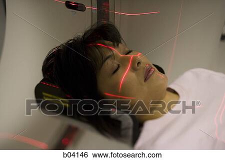 Woman having an MRI View Large Photo Image Stock Photograph - Woman having an MRI. Fotosearch