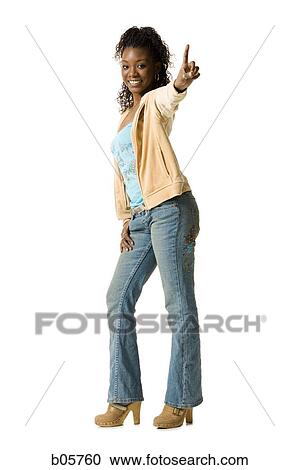 Woman holding up number one finger View Large Photo Image Stock Image - Woman holding up number one finger. Fotosearch