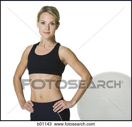 Stock Image - Woman in exercising clothes. Fotosearch