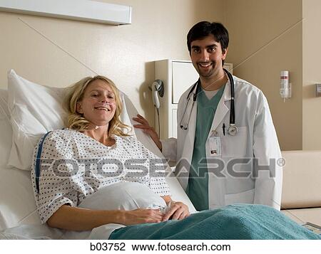 Woman in hospital bed View Large Photo Image Stock Image - Woman in hospital bed. Fotosearch
