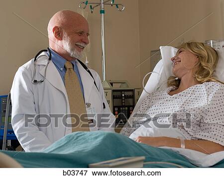 Woman in hospital bed View Large Photo Image Stock Photo - Woman in hospital bed. Fotosearch