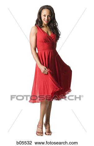 Woman in red dress View Large Photo Image Stock Image - Woman in red dress. Fotosearch