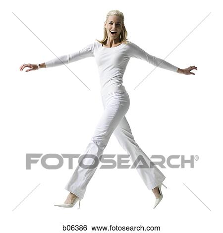 Stock Photograph - Woman jumping. Fotosearch