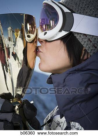 Woman kissing a trophy View Large Photo Image Stock Image - Woman kissing a trophy. Fotosearch