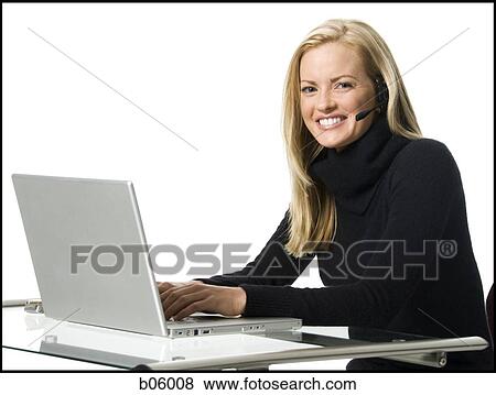 Stock Photo - Woman on a laptop. Fotosearch