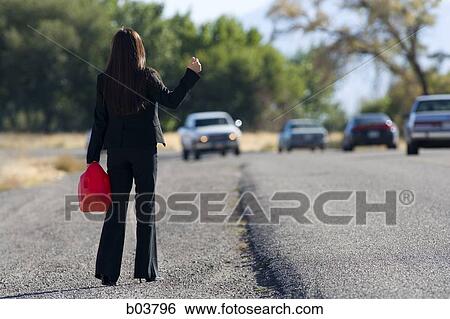 Stock Photograph - Woman out of gas. Fotosearch