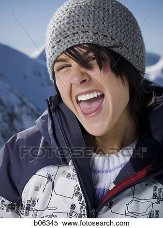 Stock Photography - Woman outside in the snow. Fotosearch