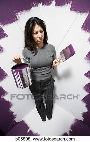 Woman painted into a corner View Large Photo Image Stock Photo - Woman painted into a corner. Fotosearch