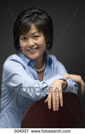 Woman posing View Large Photo Image Stock Photo - Woman posing. Fotosearch