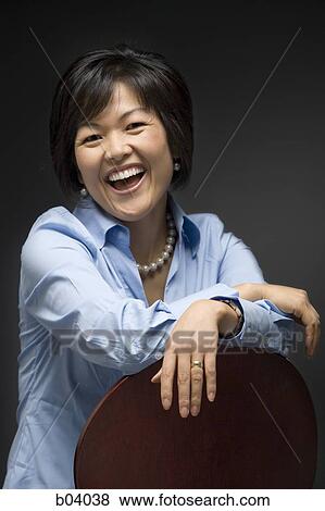 Woman posing View Large Photo Image Stock Photo - Woman posing. Fotosearch