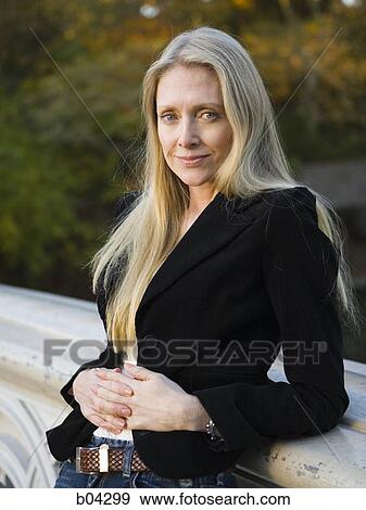 Woman posing View Large Photo Image Stock Photo - Woman posing. Fotosearch