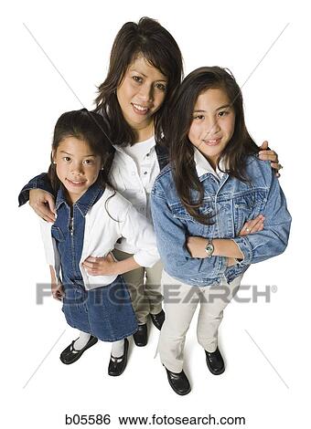 Woman posing with girls View Large Photo Image Stock Photograph - Woman posing with girls. Fotosearch
