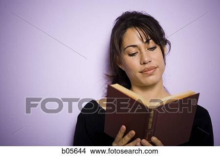 Woman reading book View Large Photo Image Picture - Woman reading book. Fotosearch
