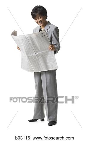 Woman reading newspaper View Large Photo Image Stock Photograph - Woman reading newspaper. Fotosearch