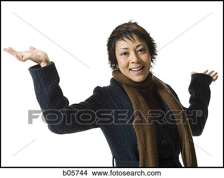 Woman shrugging View Large Photo Image Picture - Woman shrugging. Fotosearch