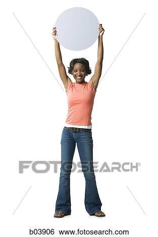 Woman standing with blank sign View Large Photo Image Stock Photograph - Woman standing with blank sign. Fotosearch