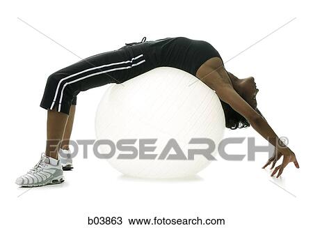 Woman stretching on pilates ball View Large Photo Image Stock Image - Woman stretching on pilates ball. Fotosearch
