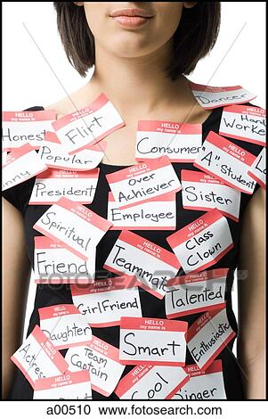 Woman wearing labels View Large Photo Image Stock Image - Woman wearing labels. Fotosearch