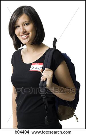 Woman wearing student label with backpack View Large Photo Image Picture - Woman wearing student label with backpack. Fotosearch