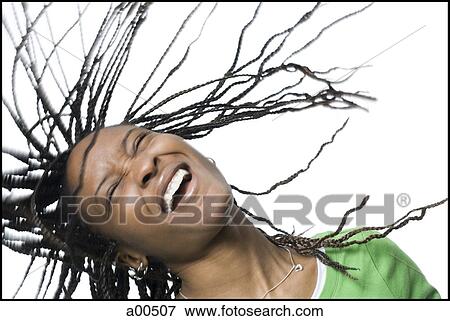 Woman with braided hair dancing View Large Photo Image Stock Photo - Woman with braided hair dancing. Fotosearch