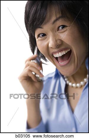 Woman with cell phone laughing View Large Photo Image Stock Photography - Woman with cell phone laughing. Fotosearch