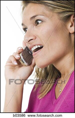 Woman with cell phone View Large Photo Image Stock Photograph - Woman with cell phone. Fotosearch