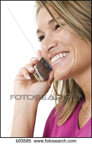 Stock Photography - Woman with cell phone. Fotosearch
