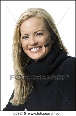 Stock Photography - Woman with earphone smiling. Fotosearch