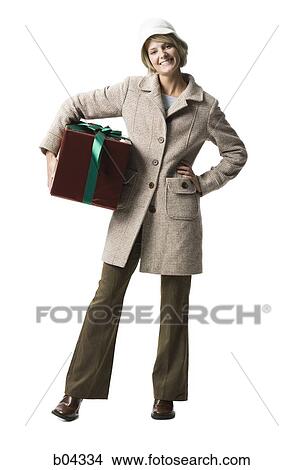 Woman with gift box View Large Photo Image Picture - Woman with gift box. Fotosearch