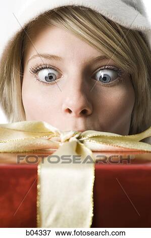 Woman with gift box View Large Photo Image Stock Photo - Woman with gift box. Fotosearch