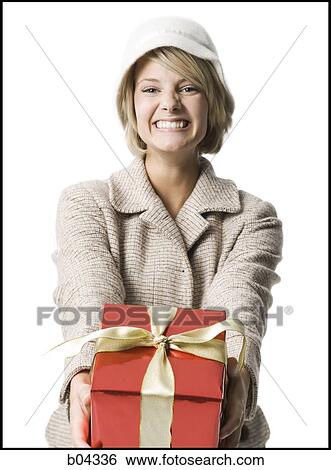 Stock Photograph - Woman with gift box. Fotosearch