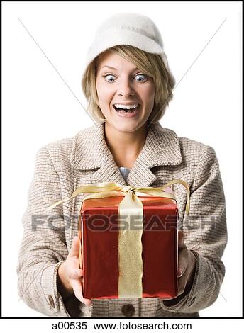 Stock Photography - Woman with gift box. Fotosearch