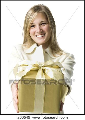 Stock Photography - Woman with gift box. Fotosearch