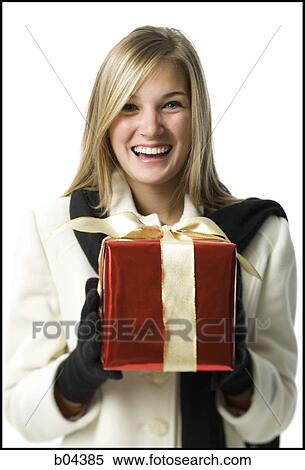 Stock Photography - Woman with gift box. Fotosearch