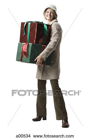 Woman with gift boxes View Large Photo Image Picture - Woman with gift boxes. Fotosearch