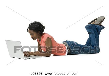 Stock Photo - Woman with laptop. Fotosearch
