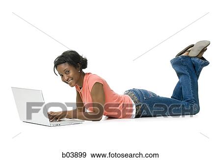 Stock Photo - Woman with laptop. Fotosearch