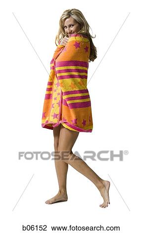 Woman wrapped in a towel View Large Photo Image Stock Image - Woman wrapped in a towel. Fotosearch